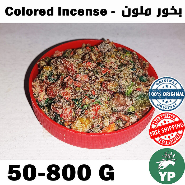 Vibrant Moroccan colored incense bokhor mix of red, green, yellow and brown botanical resins in a round red container on a white surface