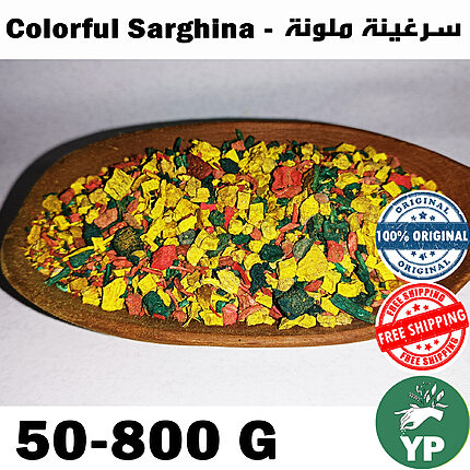 Colorful Moroccan Sarghina Bakhour incense pieces in yellow, red and green displayed on a wooden oval tray against a white background