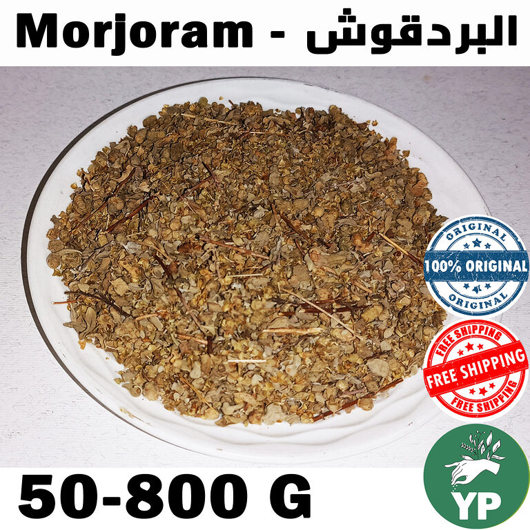 Dried marjoram leaves and stems displayed in a wooden bowl on a rustic surface with scattered whole herb sprigs