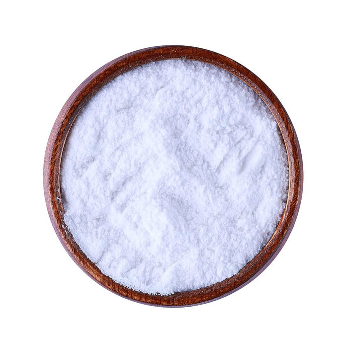 Fine white alum powder displayed in a round wooden bowl on a white background, labelled Alum Powder and Sheba Mathouna in Arabic - Variation