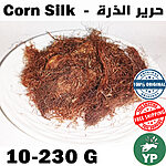Dried golden-brown corn silk threads piled on a white ceramic plate, 100% natural Moroccan herb