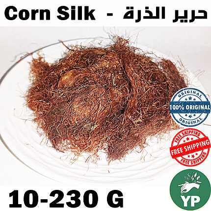 Dried golden-brown corn silk threads piled on a white ceramic plate, 100% natural Moroccan herb
