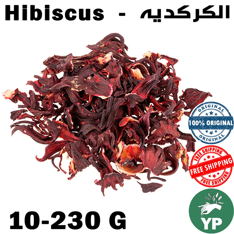 Pile of deep crimson dried Moroccan hibiscus flower petals on a white background