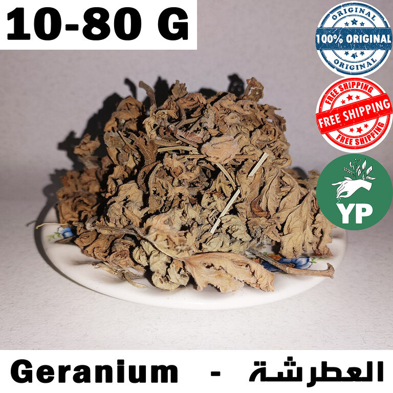 A mound of dried golden-brown Moroccan geranium leaves (Pelargonium graveolens) piled on a white decorative plate against a neutral grey background