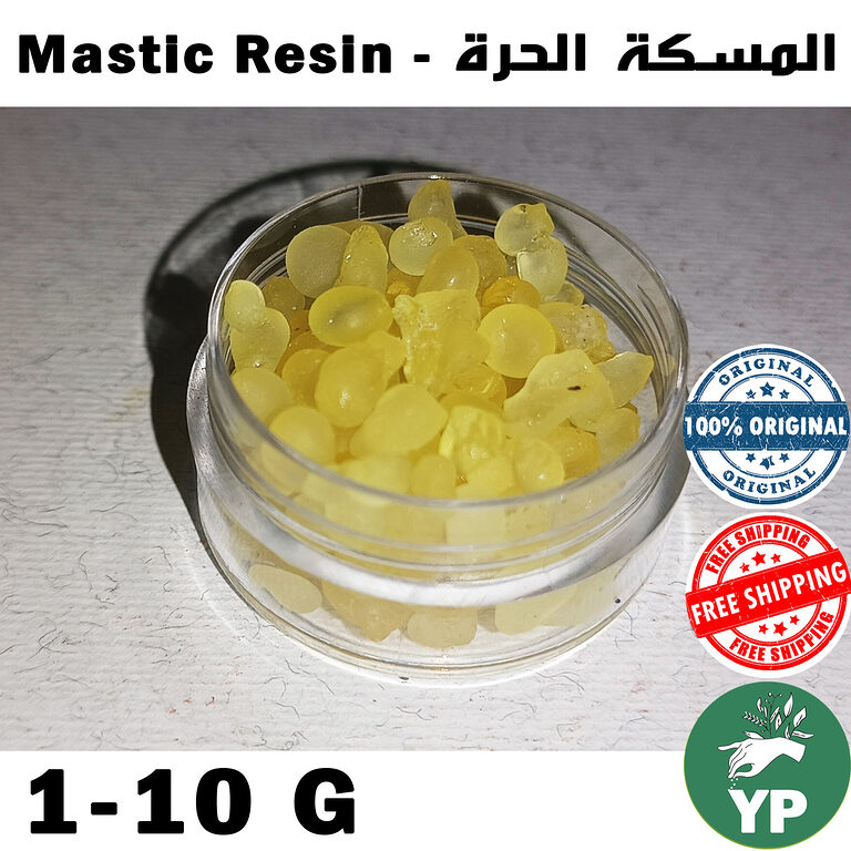Pale yellow mastic resin whole crystals in a clear glass container on a white background