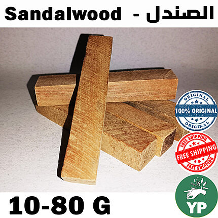 Several rectangular pieces of natural sandalwood incense wood arranged in a cross pattern on a light background, labeled Sandalwood and Alsandal in Arabic and English
