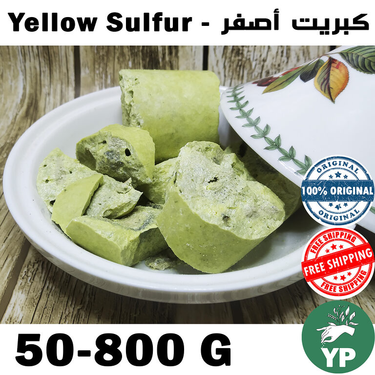 Raw yellowish-green natural sulfur mineral chunks displayed in a white decorative Moroccan dish on a wooden surface