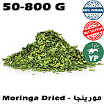 A large pile of vibrant green dried moringa leaves on a white background, shown loose and whole