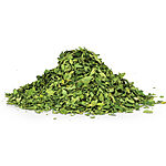 A large pile of vibrant green dried moringa leaves on a white background, shown loose and whole - Variation