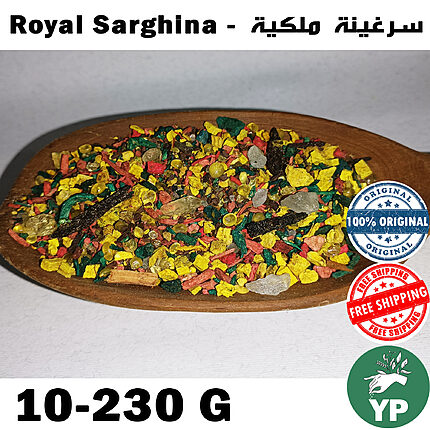 Colorful Moroccan Royal Sarghina incense blend with yellow, green, red and black botanicals and resins displayed on a rustic wooden paddle spoon against a white background