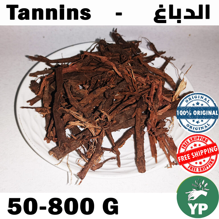 Pile of dried brown tannin-rich Moroccan Dbagh roots and bark pieces on a white plate against a light background