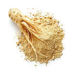 Whole ginseng root resting on a mound of fine beige ginseng powder on a white background - Variation